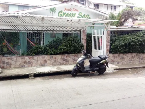 Room in Guest Room - Green Sea Inn in the San Luis Sector Hotels in San Luis