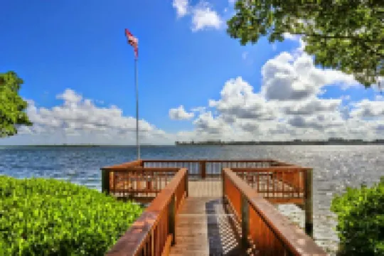 Serene Waterside Retreat with Beach Access - Charming Island Oasis