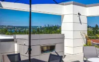 Rooftop Deck and Fitness Center - Luxurious Sophisticated Retreat
