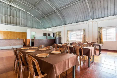 Treebo Pappilon Palace - Pvs Circle Отели рядом с достопримечательностью «Sultan Bathery»