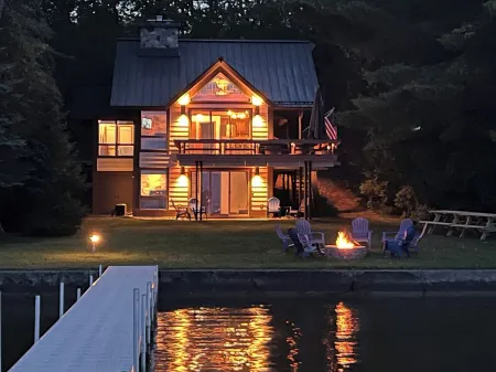 Beautiful Home w/ 2 fireplaces, Deck, and 75ft of Private Higgins Lake Frontage