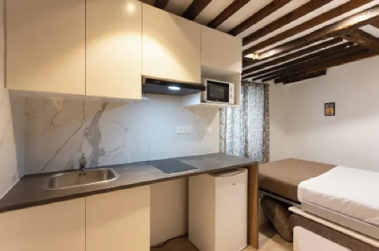 Les Studios Mademoiselle Отели рядом с достопримечательностью «Эйфелева башня»