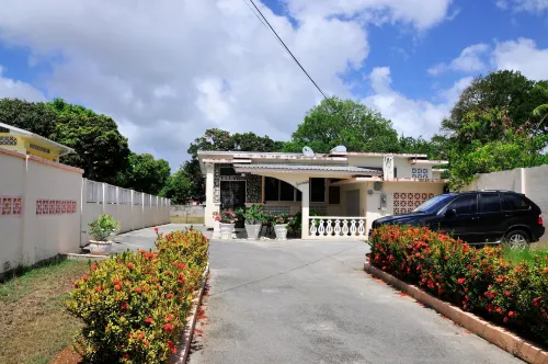 Welcome to the Unpretentious and Breezy Graceville, Steps Away from the Beach