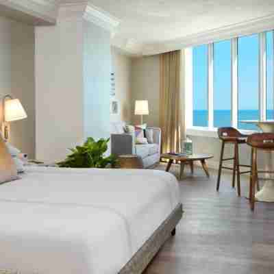Pelican Grand Beach Resort, a Noble House Resort Rooms