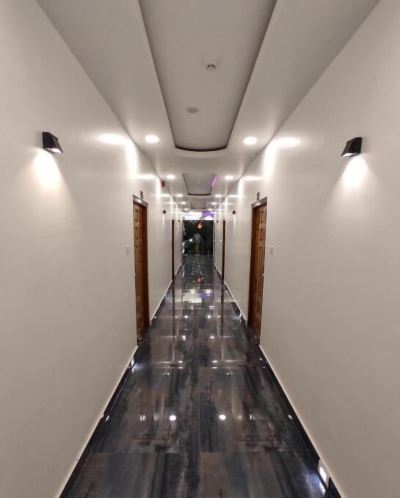 Corridor Hotel De Pebbles Photo