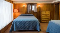 Escape to the Northwoods at this picturesque Sand Lake home