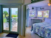 Jacksonville Beach Oceanfront condo with private patio, pool / pet friendly