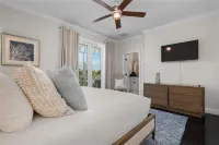 Luxury Beach side escape, steps from private beach, restaurant, marina, and café