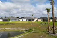 Home w/ Lanai + Community Perks in the Villages! - parking