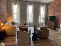 Stylish & Modern 2-Bdrm Apt in Downtown Warsaw featuring an urban rooftop deck.