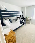 Pet friendly! King bed, smart TVs, mins to beaches from this brand new townhome