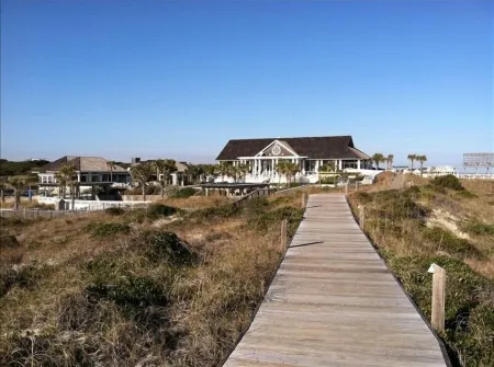 "The Palms" is nestled on a secluded half acre in the forest.  ThePalmsHouse.com