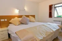 Two bedroom apartment situated in the countryside parish of St Pierre du Bois Hotels in 