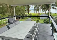 Large Lakefront House on Lake Macquarie with Kayaks, Kids Toys and Dog Door Hotels in Caves Beach