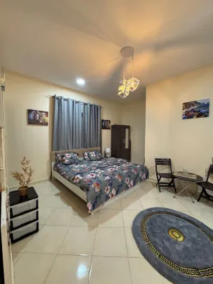 Charming studio apartment in amazing Sharjah with AC, WiFi Hotels in Al Heerah Suburb