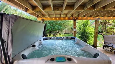 Modern renovated walkout bsmt with new Hot tub