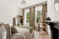 Modern Double En-Suite near Euston -  Ferienwohnungen