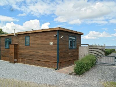 6 Pers. Holiday Home Aurora with Directly on the Lauwersmeer