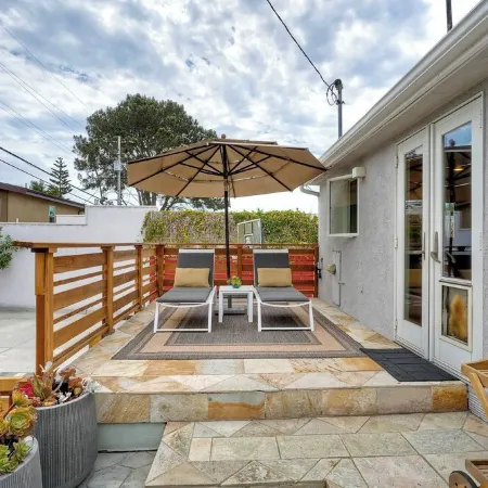 Family-friendly summer vacation home with big hot tub 2 blocks from beach.
