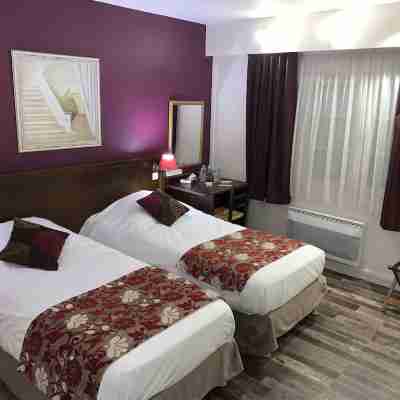 Logis Hôtel les Nymphéas Rooms