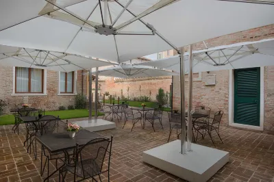 桑塔露琪亞NH飯店 福圖尼宮附近的飯店