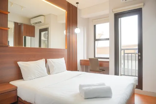 Relaxing and Homey Studio Transpark Cibubur Apartment By Travelio