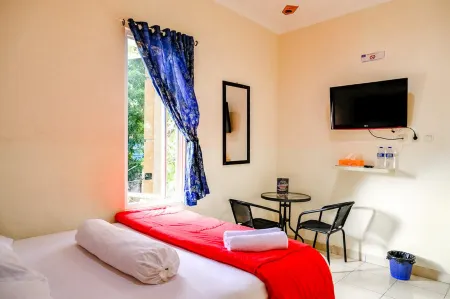 Pondok Malabar Mitra RedDoorz Отели рядом с достопримечательностью «Музей текстиля»