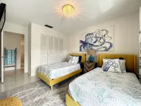 Cute canal front Cottage with dock & boat lift and pool ,short walk to the beach