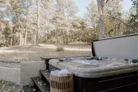 Tranquil Forest Retreat: Designer 4-Bedroom Ranch with Hot Tub & Firepit