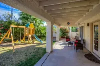Family Friendly Desert oasis on golf course with Heated Pool!