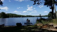 Maine Lakefront Cottage Rental with Sandy Beach