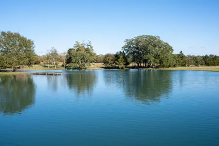 Farmhouse bed and bath with pool and hot tub