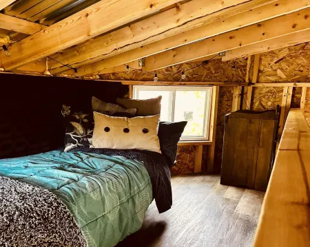 Immerse yourself with nature at this unique living tree-treehouse!