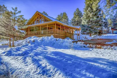 Log cabin at Vallectio lake with wrap around porch!