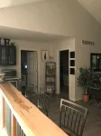 View of Lake Fenton with hot tub and fire place