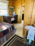 Stay in this charming vintage cabin with a wood burning fireplace,