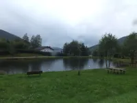 Charming chalet located on the edge of a lake with views of the ski slopes Hotels in Ventron