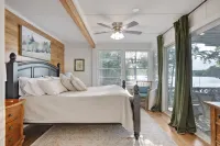 Newly Renovated Lakefront home with boat house, launch and 2 piers!