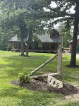 Real Log Cabin with Seasonal Pool and Hot Tub near Blue Springs Ranch