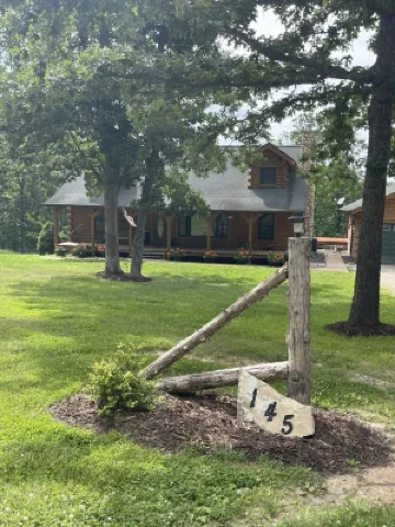 Real Log Cabin with Seasonal Pool and Hot Tub near Blue Springs Ranch