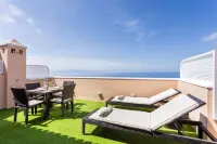 APARTMENT A few meters from a black sand beach.