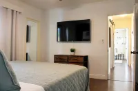 A beautifully renovated private home with a large backyard, Pool, and Hot Tub