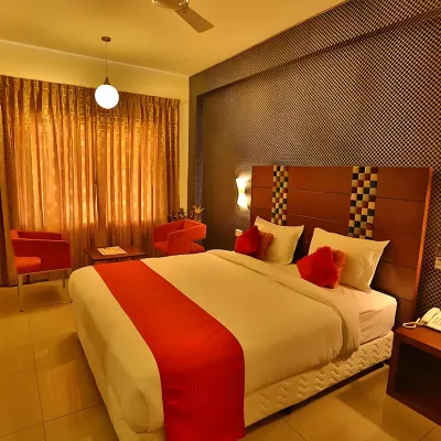 Hotel Vels Grand Inn Отели рядом с достопримечательностью «Водопад Kovai Kutralam»