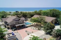Villa Minerva Eco-Farm & Beach Resort 바이센테니얼 공원 주변 호텔