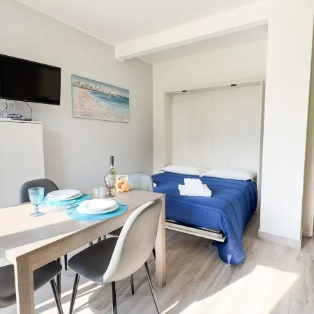 Onda Blu House by Ca-Sa Check Отели рядом с достопримечательностью «Sabbia e Sale Feeling Beach»