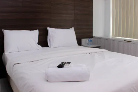 Great Location Studio Room at Patraland Urbano Apartment