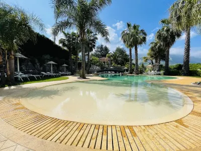 Villa Caribe Restaurant Resort & Spa Hotels near Spiaggia dei Sassolini