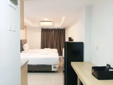 Comfy and Nice Studio at 27Th Floor de Prima Apartment Отели в г. Sei Putih Tengah