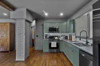 Gourmet Kitchen and Indulgent Oversized Tub - Exquisite Modern Haven Hotel a New Britain