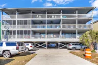Beautiful home across from beach with pool, central AC, balcony & washer/dryer